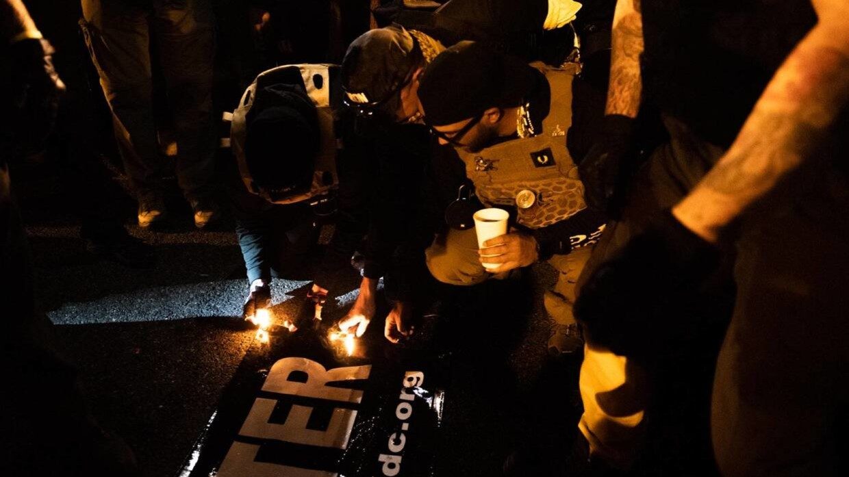 Click to enlarge burning BLM flag