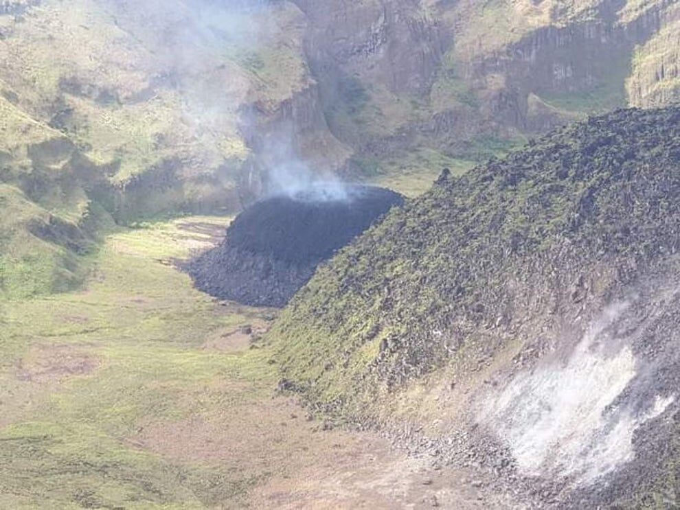 La Soufriere began spewing ash along with gas