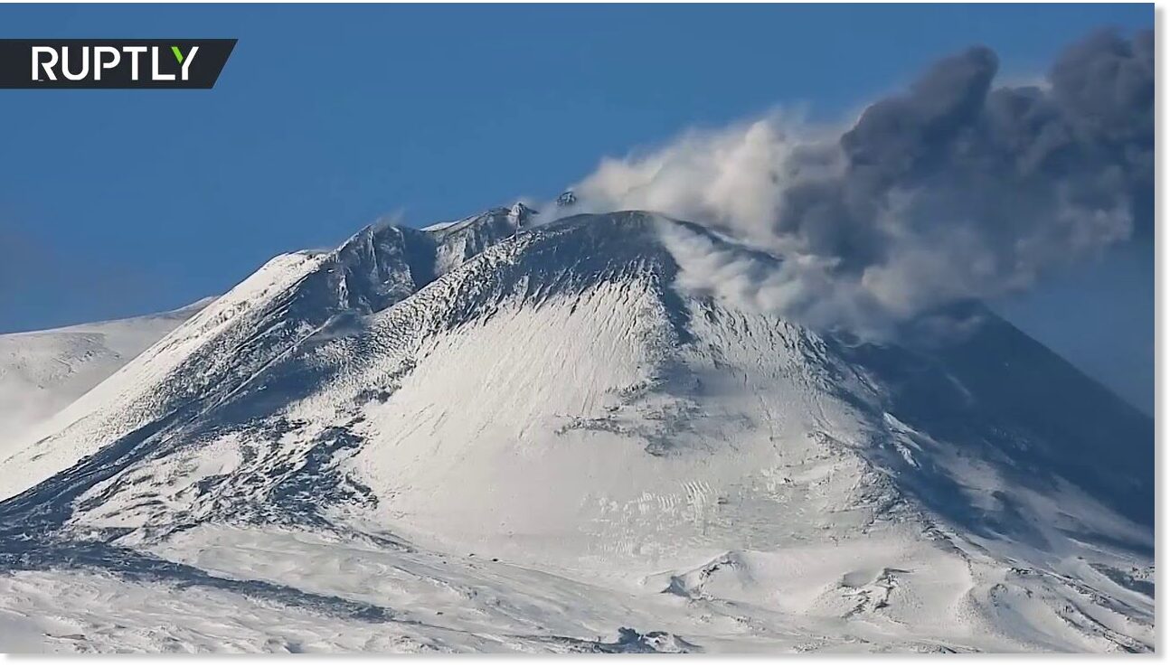 Snowcovered Mt. Etna sends clouds of smoke into the sky 40 quakes in