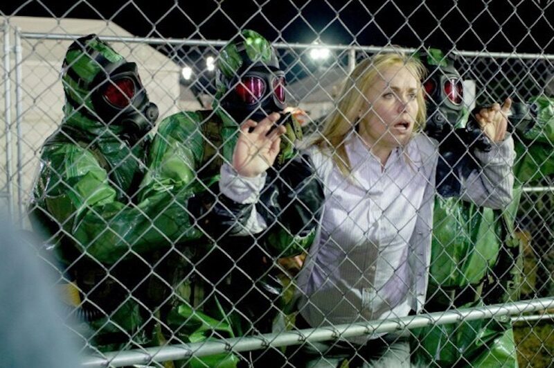 Click to enlarge fenced in woman