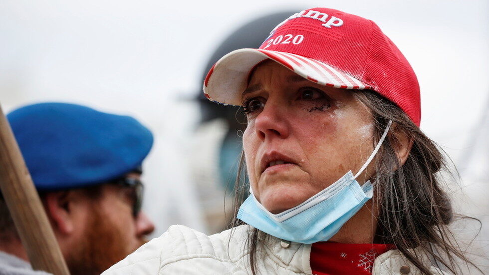 Click to enlarge supporter of Donald Trump reacts
