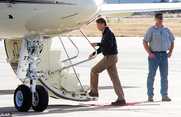 Bill Gates boards a private jet