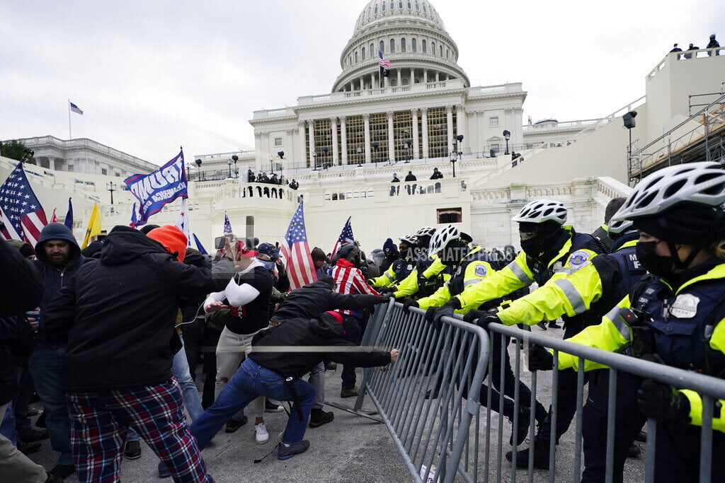 Click to enlarge storming capitol building