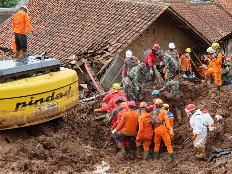 Rescuers search for victims of two landslides that hit Sumedang, West Java