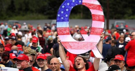 Click to enlarge “Q” signrallyTrump supporters.