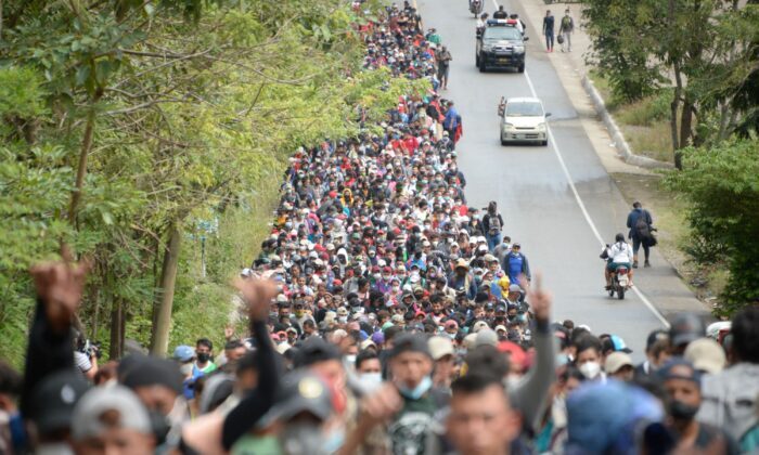 Click to enlarge honduran migrants biden