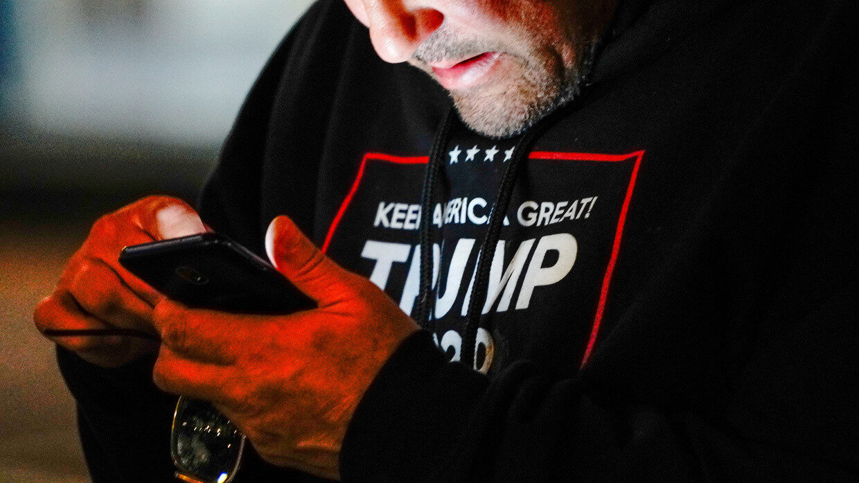 Click to enlarge trump supporter on phone