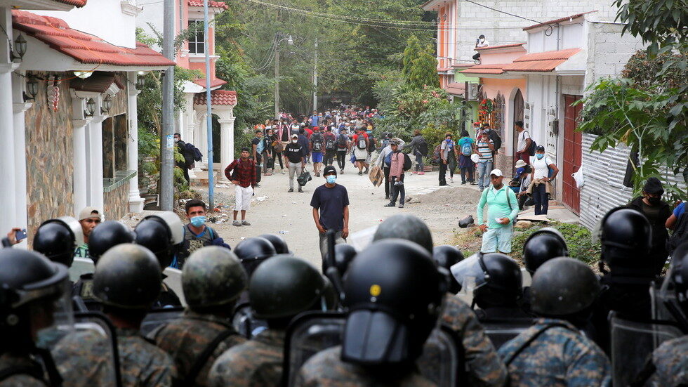 Click to enlarge honduran migrants biden