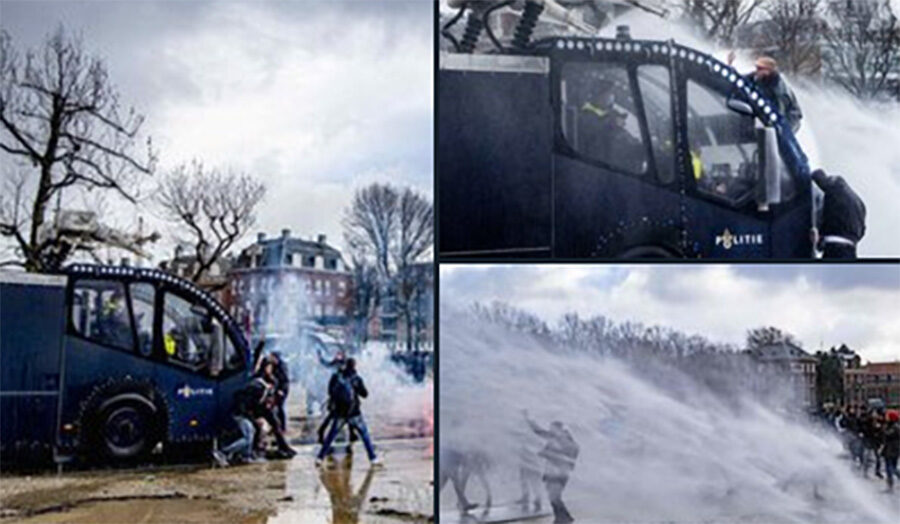 Click to enlarge Dutch Police Spray Watter Cannon At Protesters