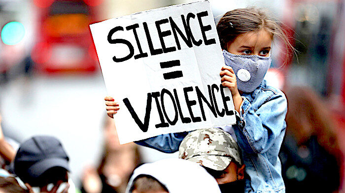 child with sign