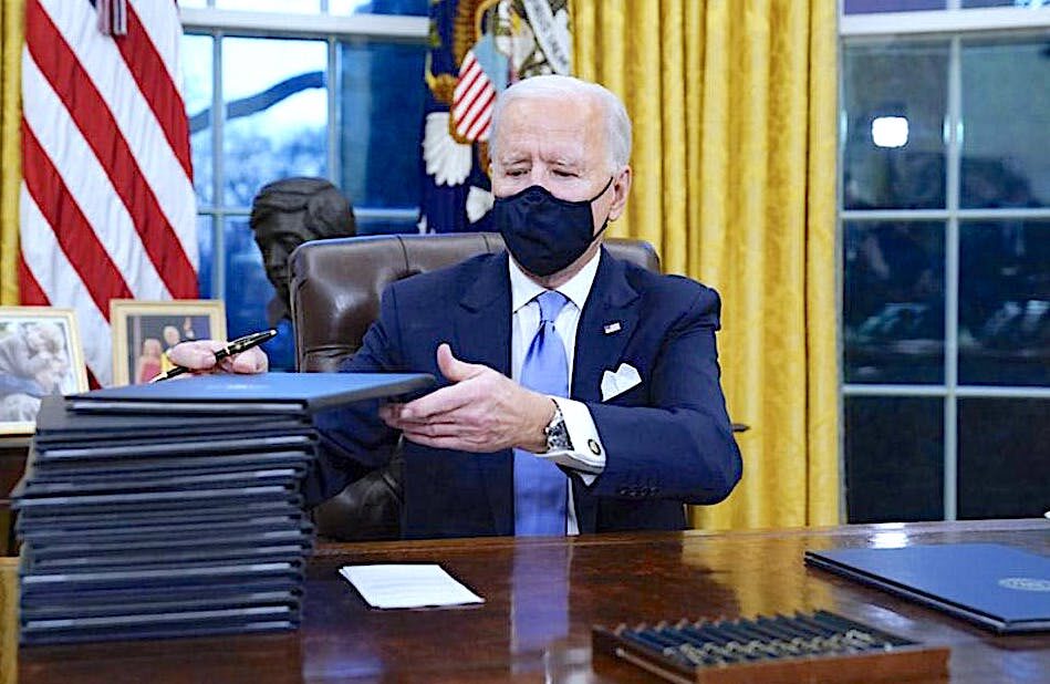 Biden signs EOs
