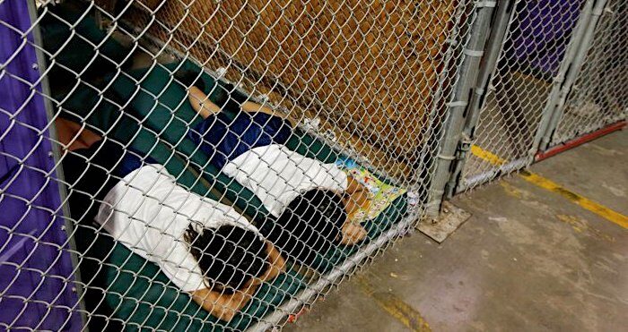 Click to enlarge kids caged