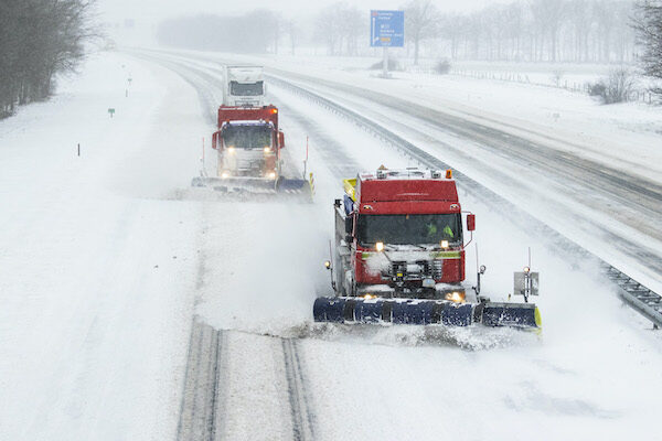 Snow ploughs in action on the A1 motorway on