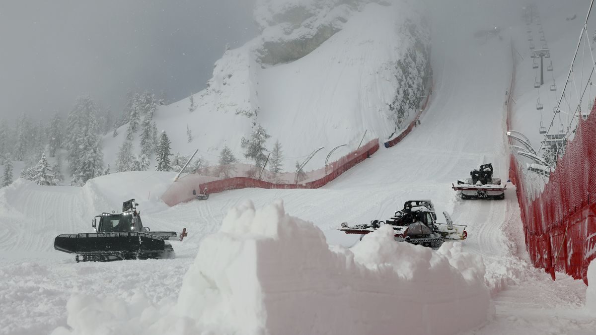 Snowcats clear the snow along the Olympia delle