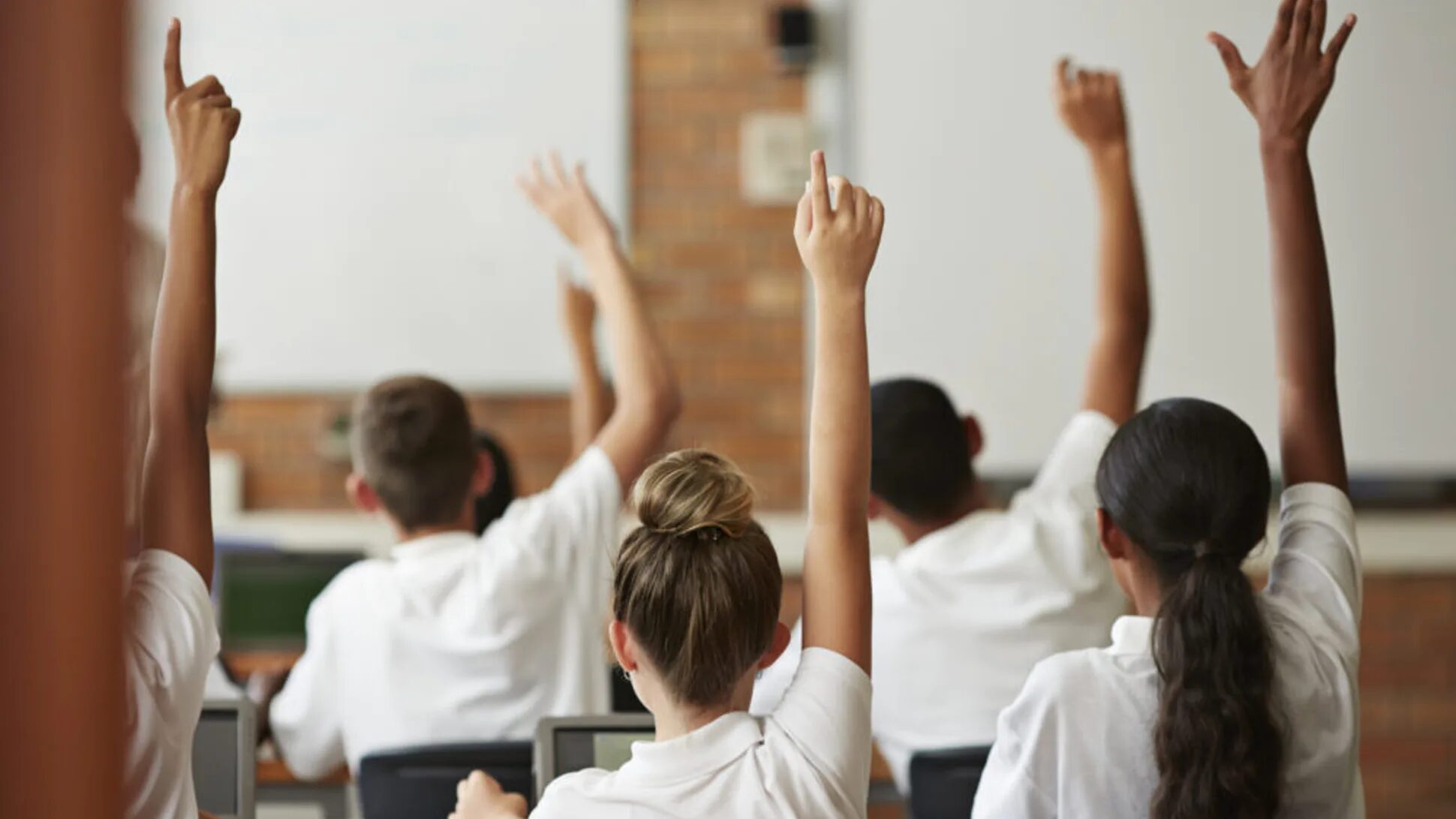 students class raised hands