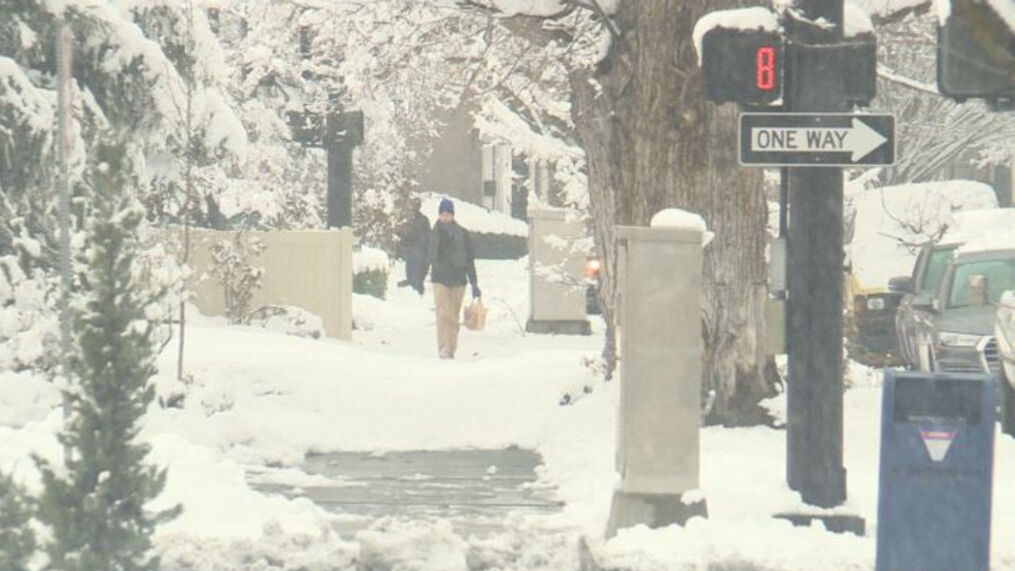 People walking through the snow in downtown Boise