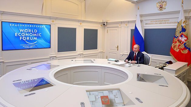 Click to enlarge Putin with WEF