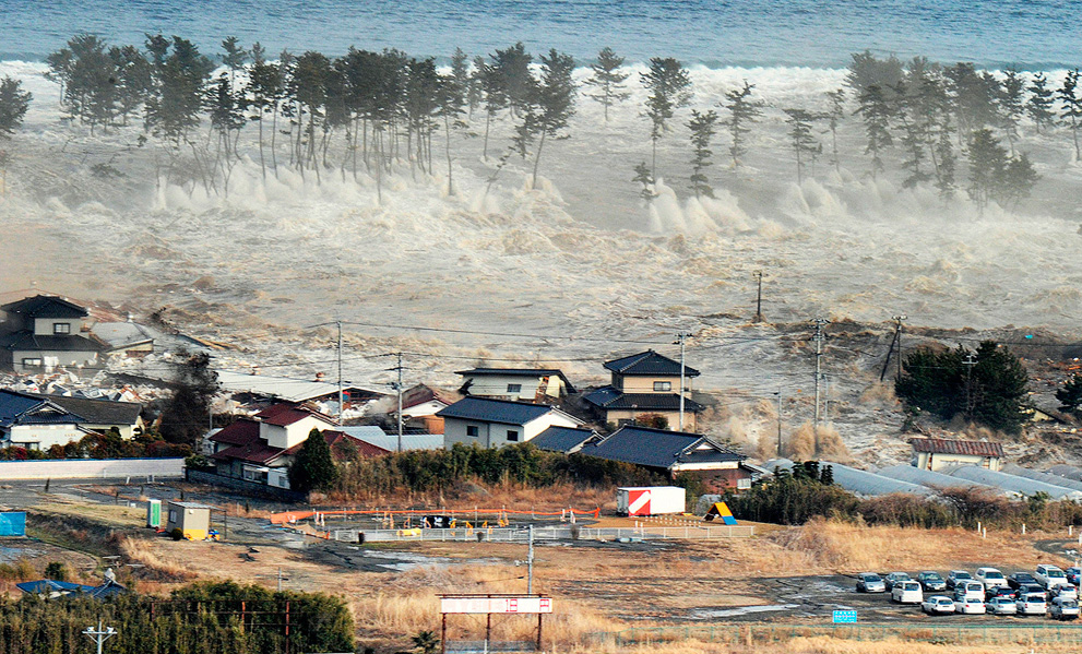 A massive tsunami sweeps in