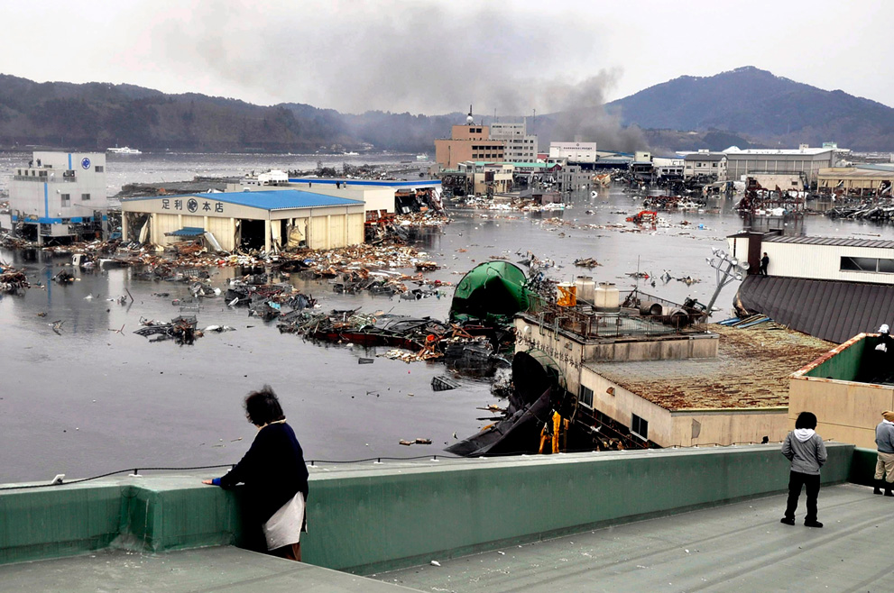 tsunami washes away a warehouse
