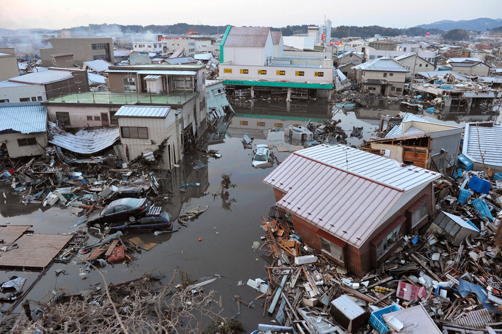 Buildings swept by a tsunami