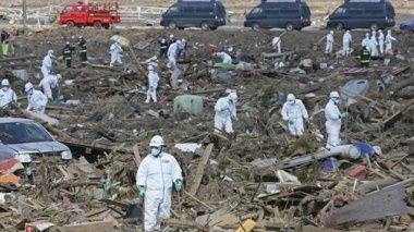 Click to enlarge searchers in hazmat