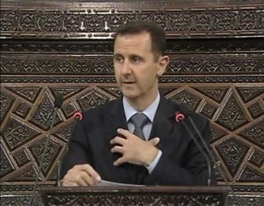 Click to enlarge Syrian president
