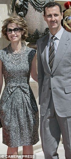 Click to enlarge Assad and wife