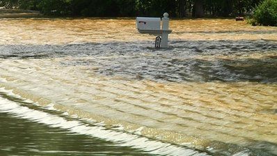 mailbox in floodwaters