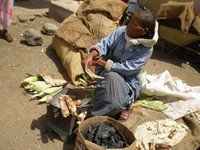 Woman selling corn
