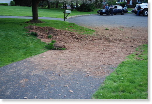 Click to enlarge a trench created on township lawn