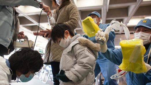 children being checked 4 radiation