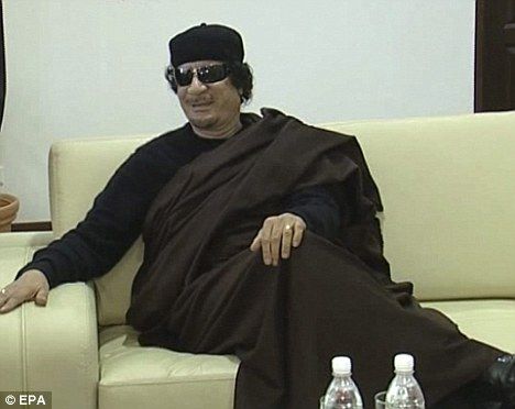 Click to enlarge Muammar Gaddafi
