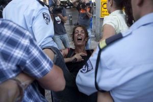 Click to enlarge activist arrested