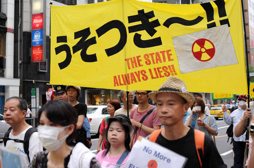 Protesters march in an anti-nuclear rally