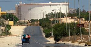 Click to enlarge A truck carrying rebel fighters driving toward the oil refinery in Zawiyah, Libya, last week.