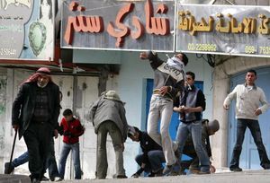 palestinian boys throw stones