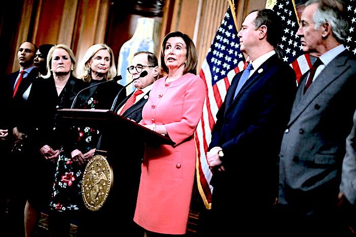 Click to enlarge Pelosi and group