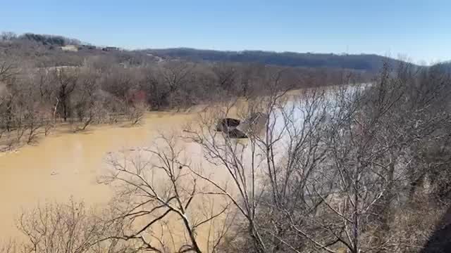 Click to enlarge Loose marina floats down Kentucky River