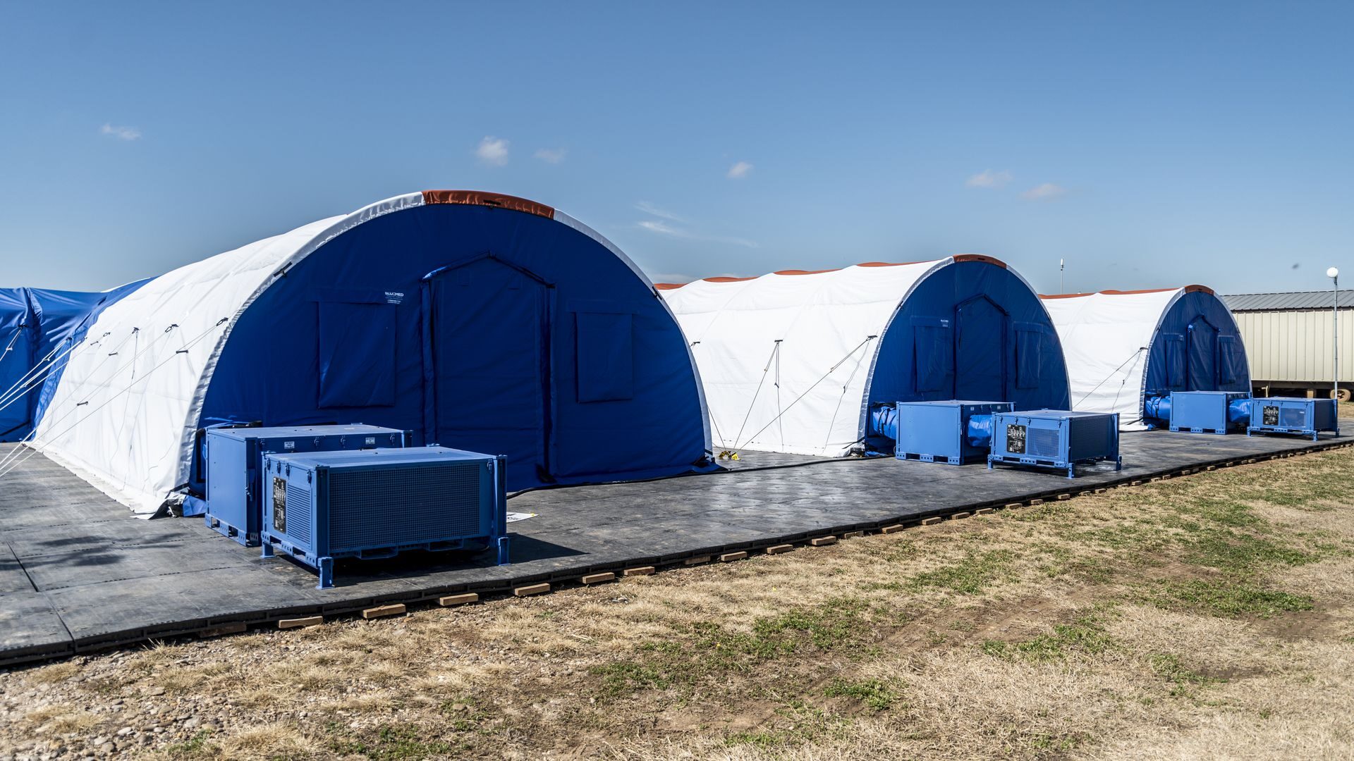 Click to enlarge medical tents migrant camp CDC carrizo texas