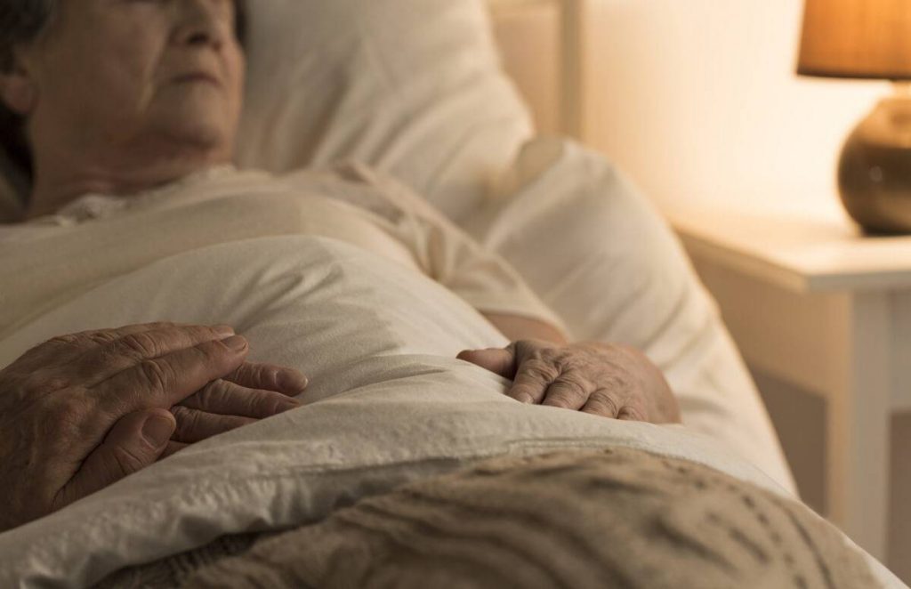person in bed