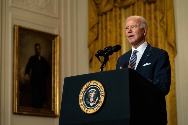 President Joe Biden delivers remarks in the East Room of the White House.