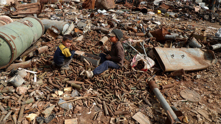 Idlib child bullet casings scrapyard syria