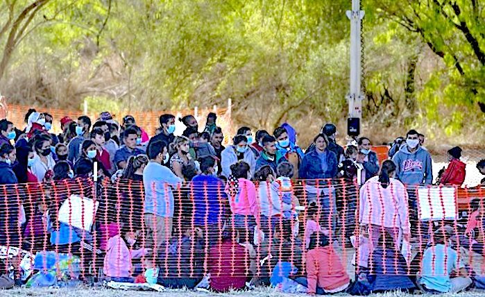 Migrants wait