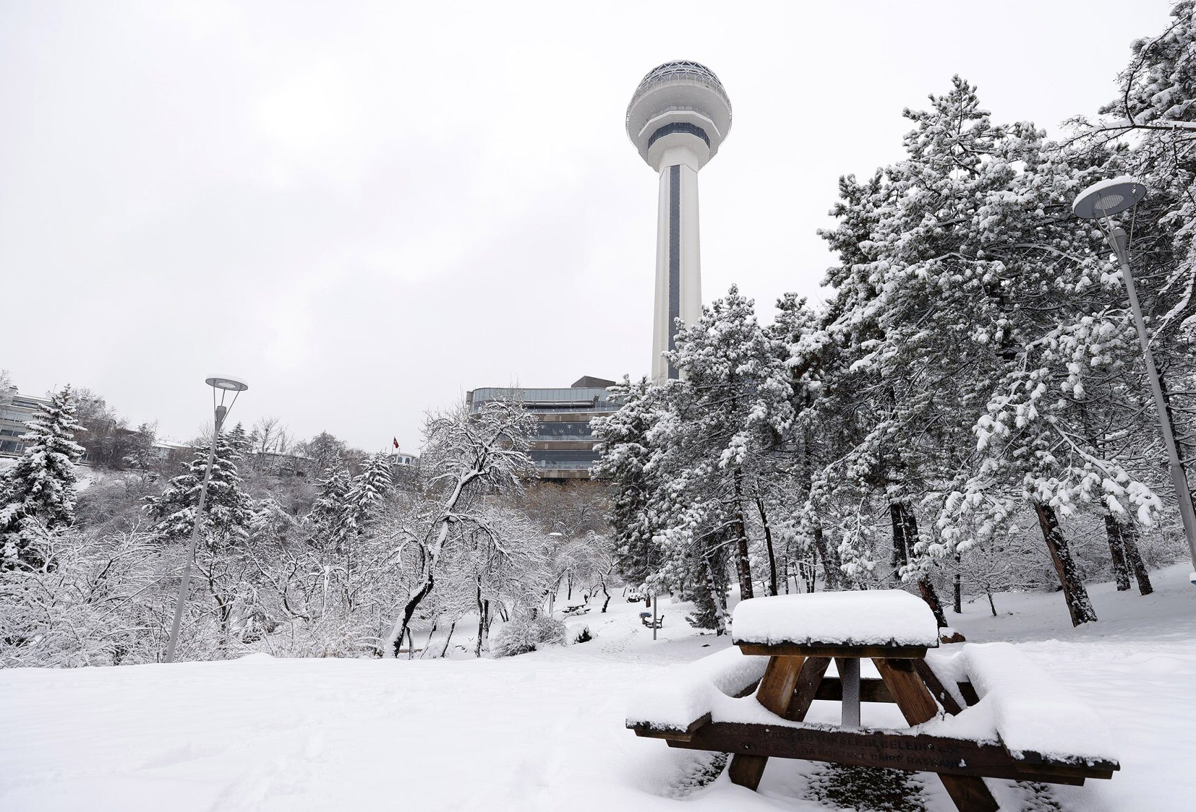 A view of Ataküle during snowfall in the nation's capital, Ankara, March 24, 2021.