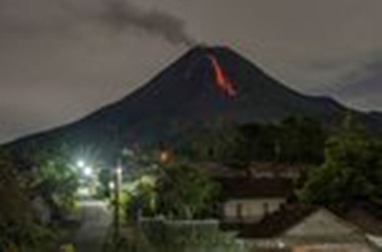 Lava flows down from the crater of Mount Merapi, March 27