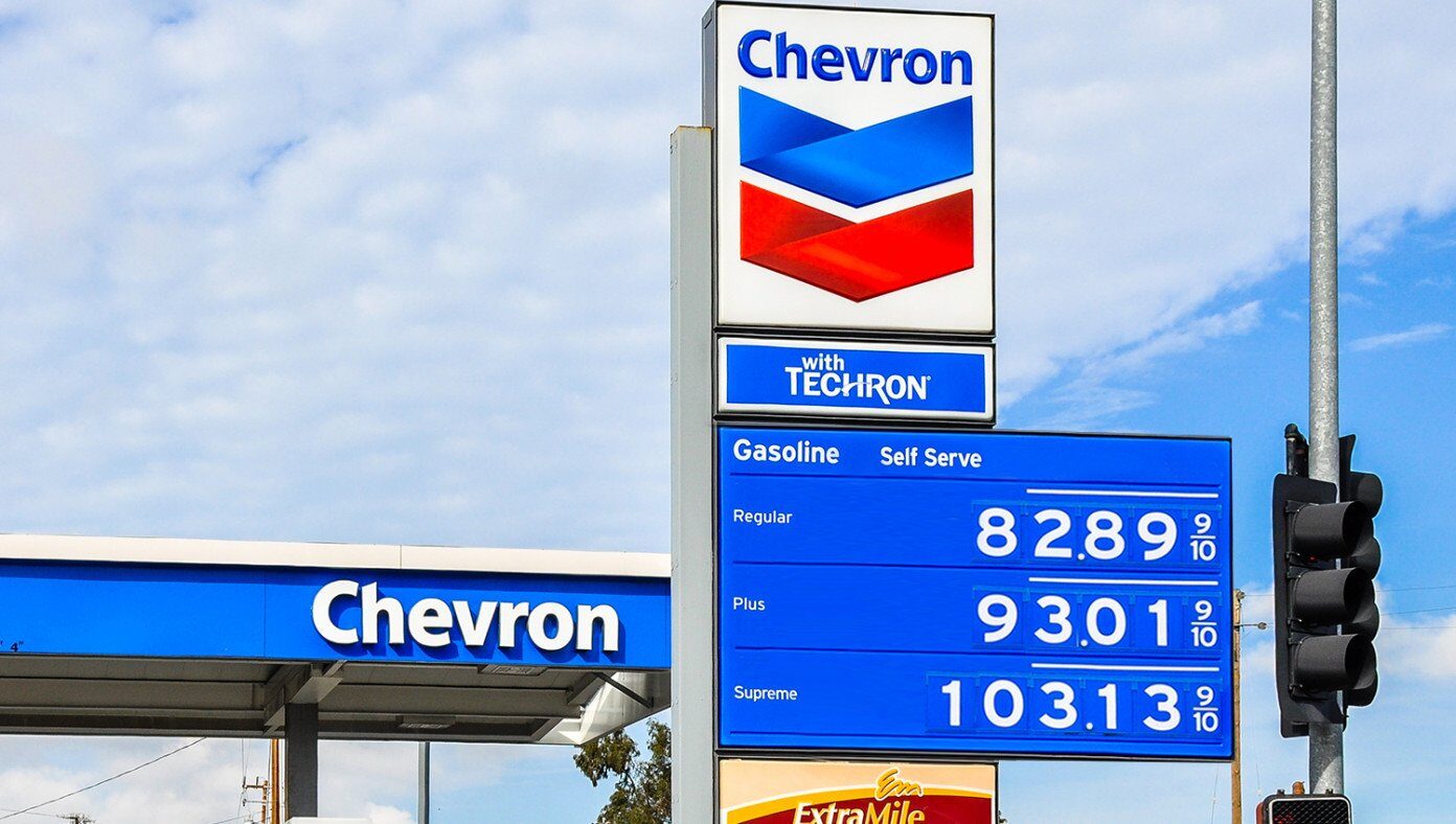 Click to enlarge satire gas stations bigger signs wider
