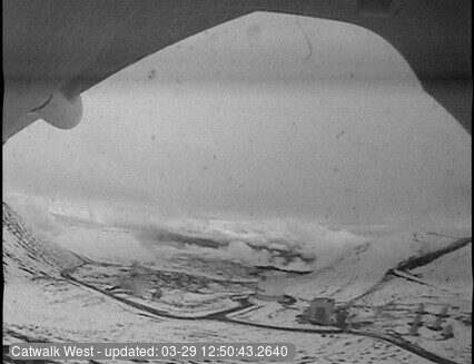 Click to enlarge The view from the a webcam perched on the catwalk on the Subaru Telescope atop Mauna Kea shows a wintry landscape today.