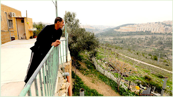 Palestinian on balcony