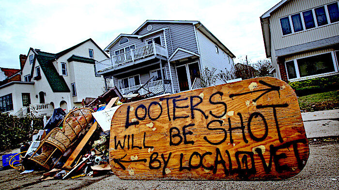 Click to enlarge Looters sign