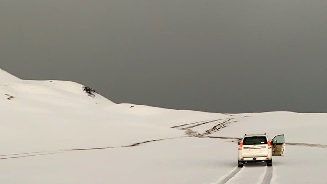 Saudi Arabia's Hail covered in a white blanket after a hail thunderstorm affected the region.